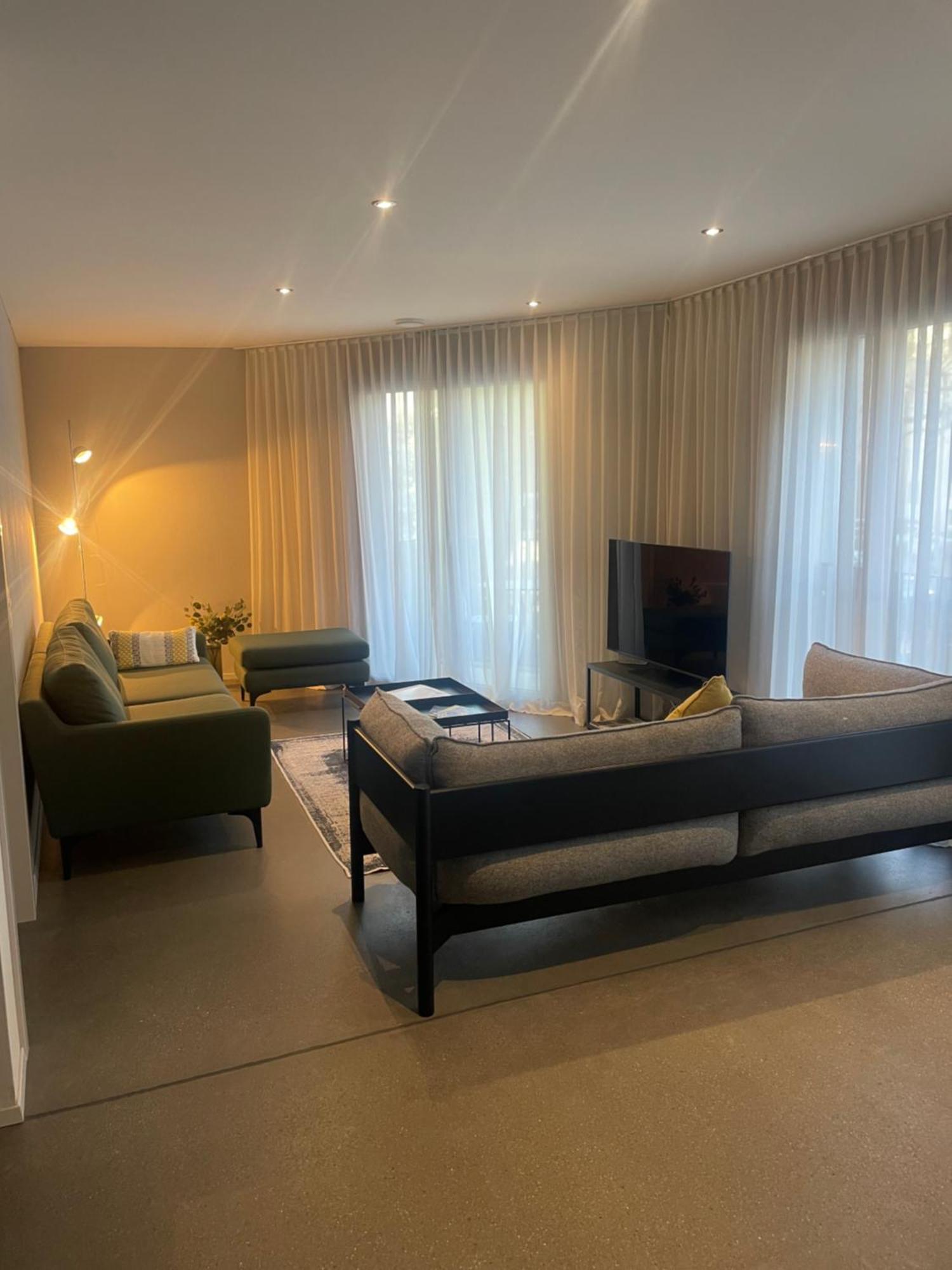 Modern City Apartments Интерлакен Экстерьер фото