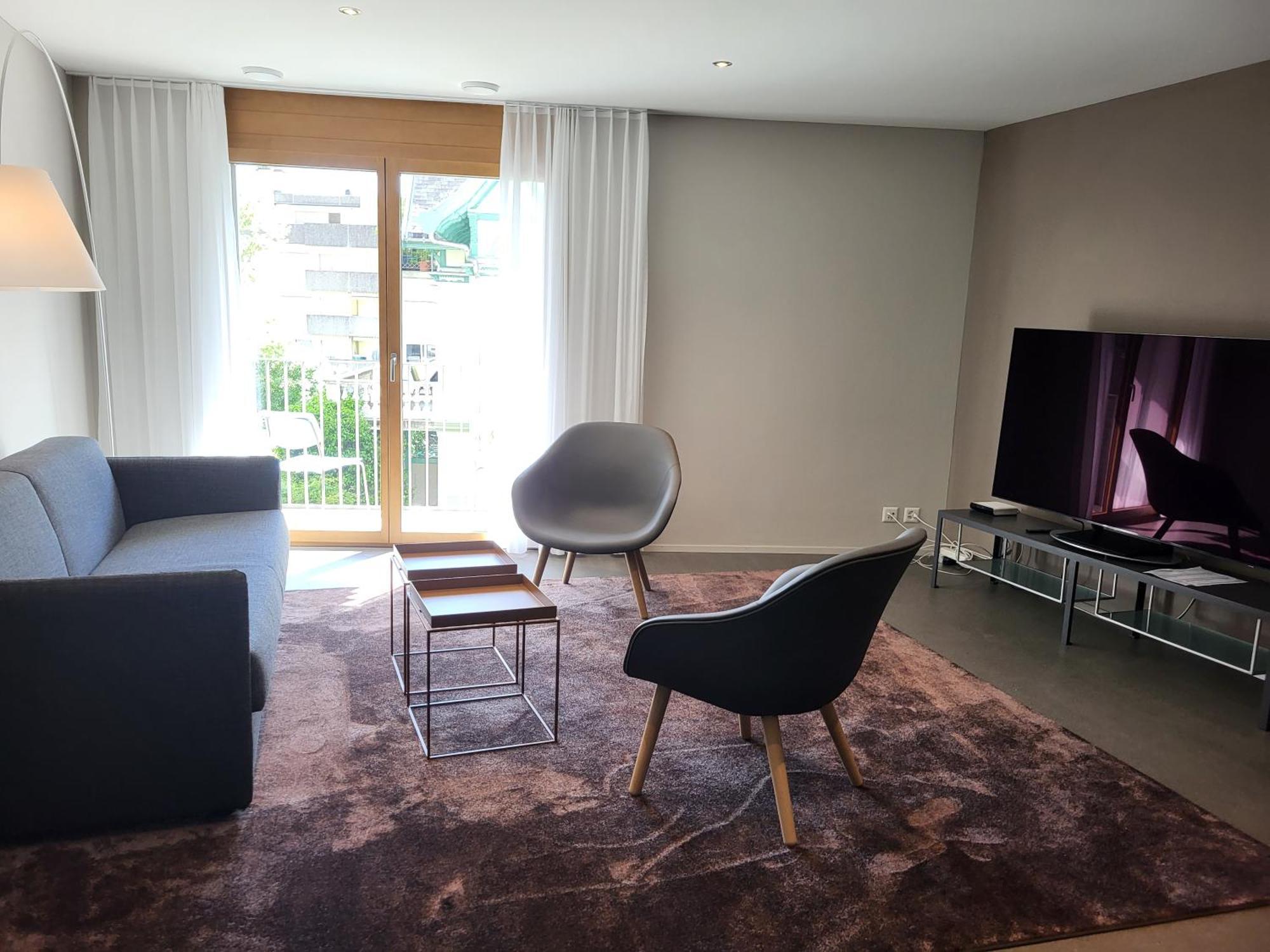Modern City Apartments Интерлакен Экстерьер фото